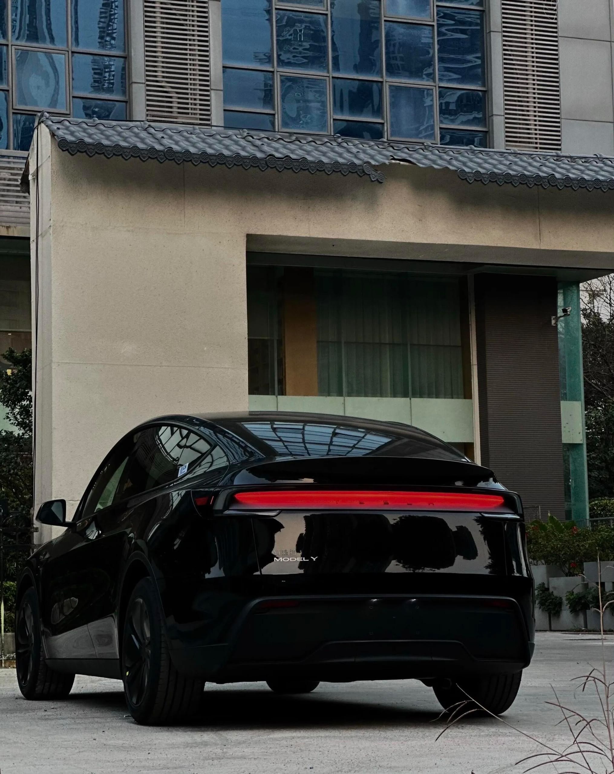 Tesla Model Y rear exterior with red light bar