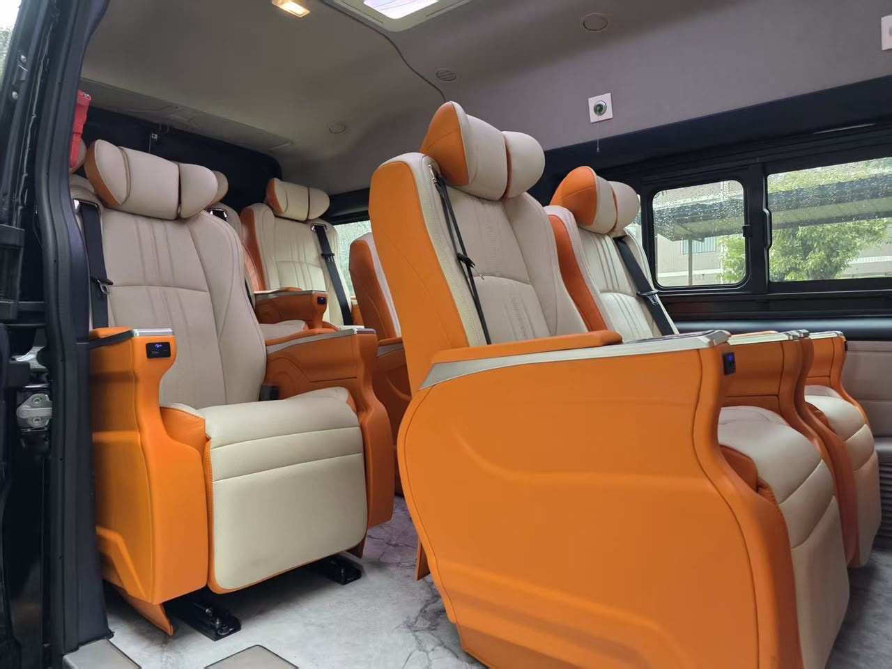 JMC van captain seat close-up with USB charging port